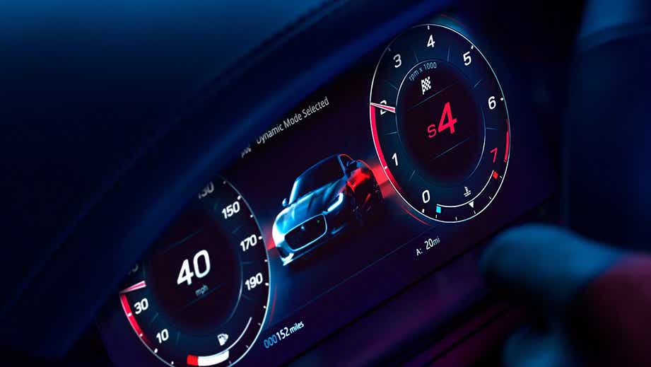 Digital dashboard of a Jaguar F-Type showing speed and rpm gauges