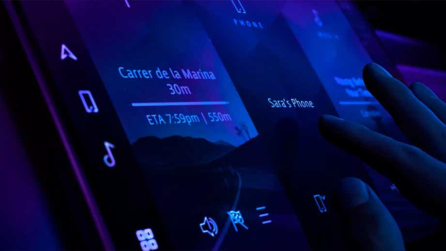 Close-up of infotainment touchscreen in a Jaguar XF