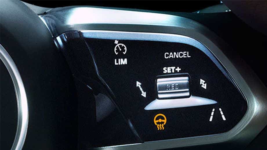 Steering wheel control close-up of a Jaguar I-Pace