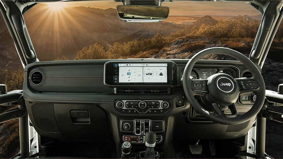 Interior dashboard view of a Jeep Wrangler