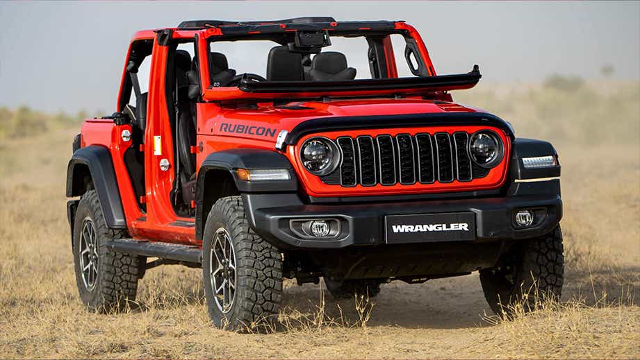 Front three-quarter view of a FireCracker Red Jeep Wrangler Rubicon