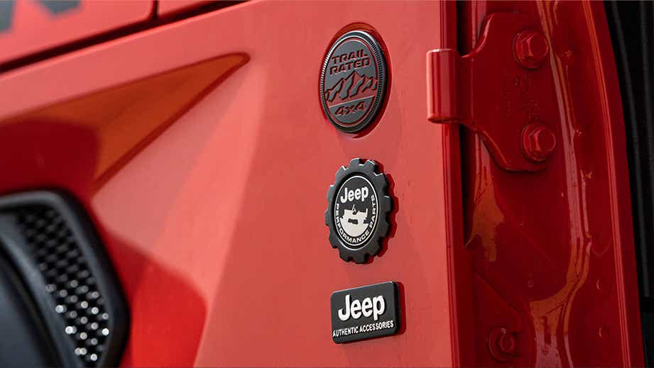 close-up of exterior badges on a Jeep Wrangler