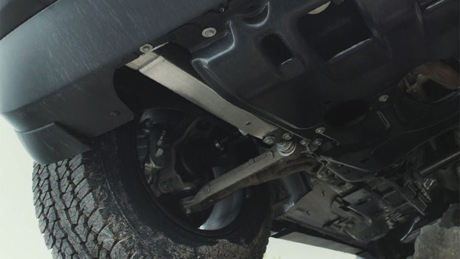 Undercarriage and rear wheel view of a Jeep Compass