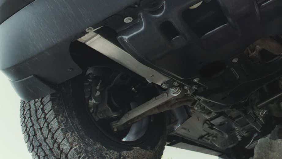 Undercarriage and rear wheel view of a Jeep Compass