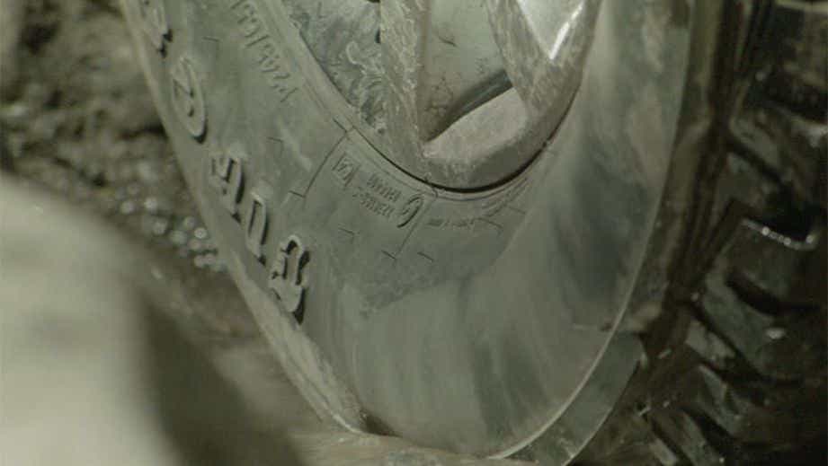 close-up of a wheel and tire on a Jeep Compass