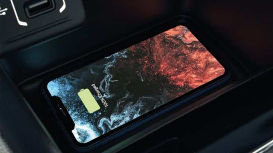 wireless charging pad with a smartphone in a Jeep Compass