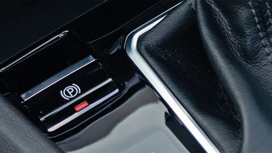 Electronic parking brake close-up of a Jeep Compass