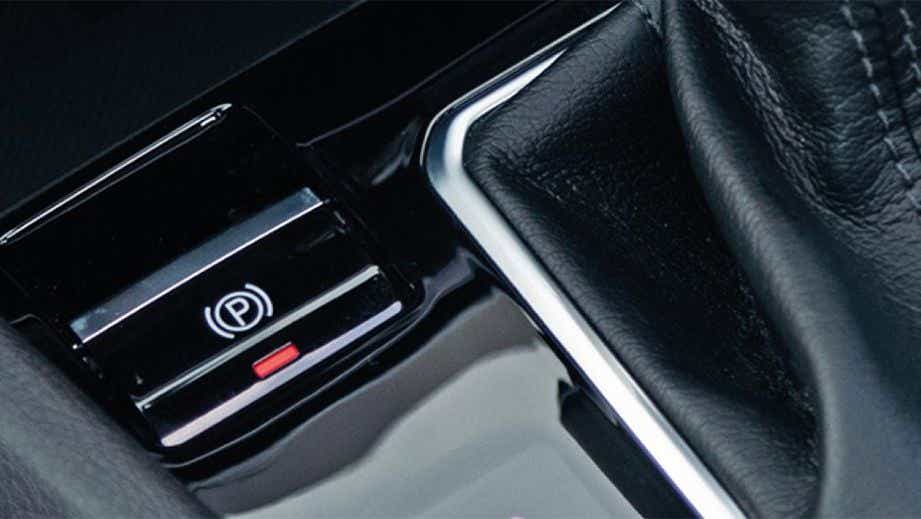 Electronic parking brake close-up of a Jeep Compass