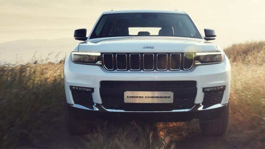 front view of a Bright White Jeep Grand Cherokee
