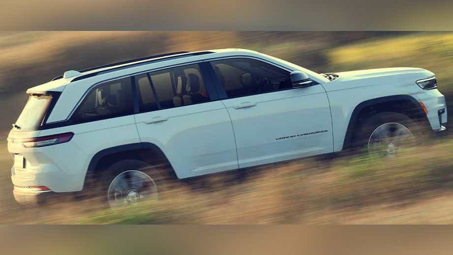 side view of a Bright White Jeep Grand Cherokee