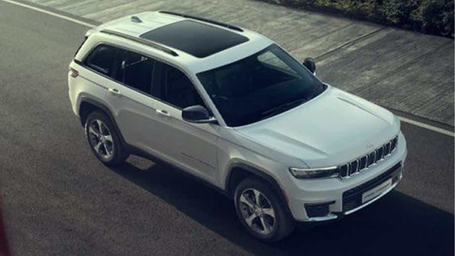 High-angle view of a Bright White Jeep Grand Cherokee