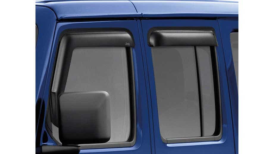 Side window and mirror view of a Jeep Wrangler 2021-2023