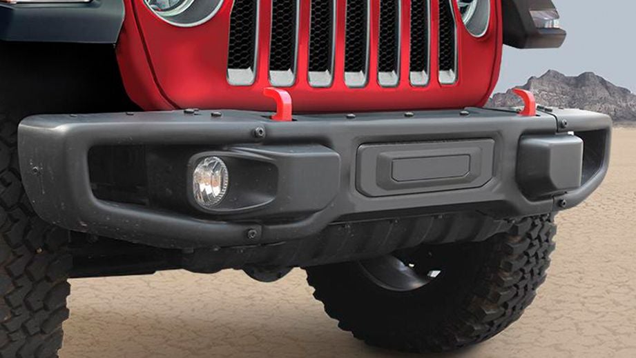 front bumper and grille of a Firecracker Red Jeep Wrangler 2021-2023