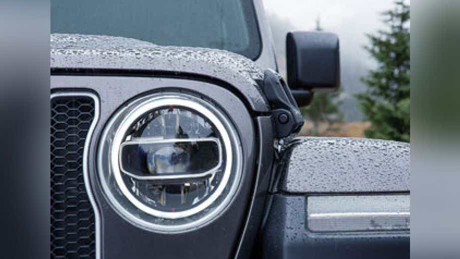 Headlight close-up of a Jeep Wrangler 2021-2023