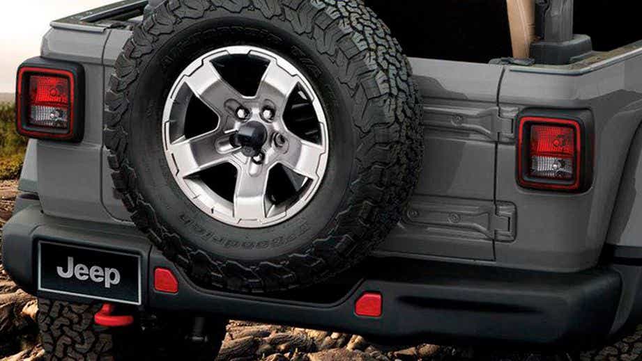 Rear view showing spare tire and tail lights of a Jeep Wrangler 2021-2023