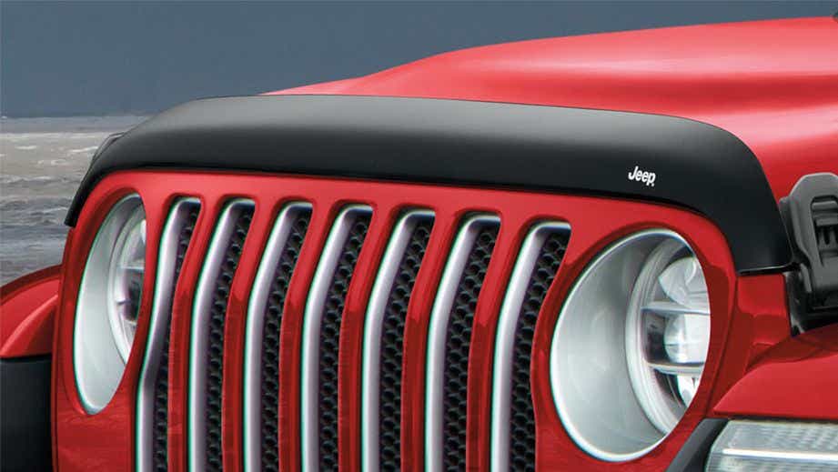front grille and headlights of a Jeep Wrangler 2021-2023