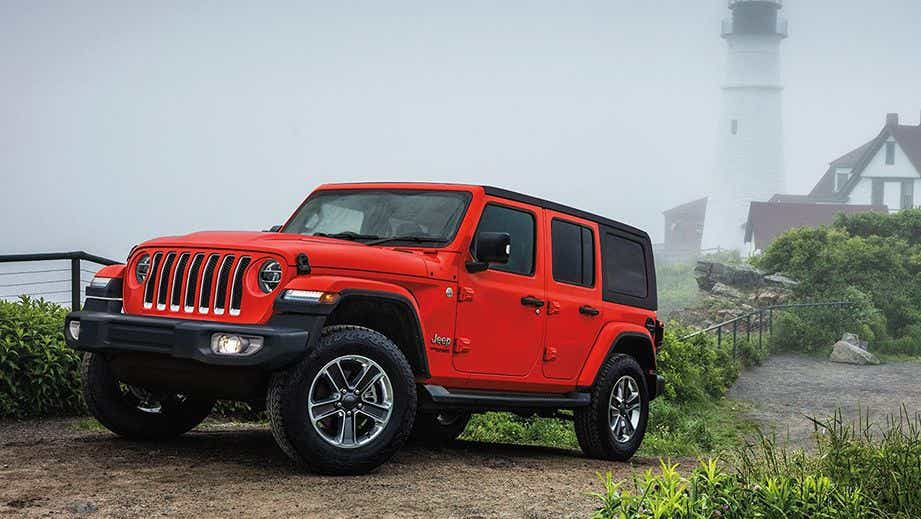 front three-quarter view of a Firecracker Red Jeep Wrangler 2021-2023