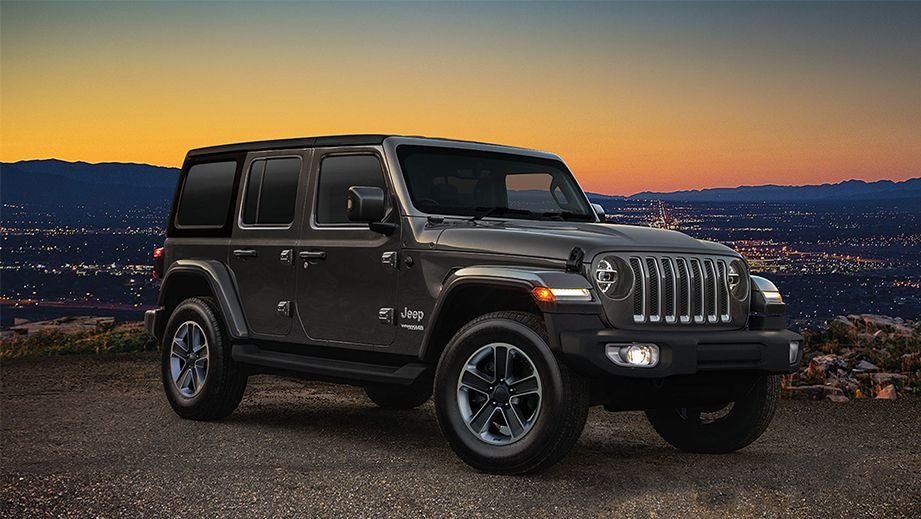 Front three-quarter view of a Granite Crystal Jeep Wrangler 2021-2023