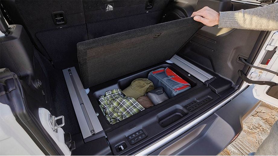 Cargo area storage compartment of a Jeep Wrangler 2021-2023