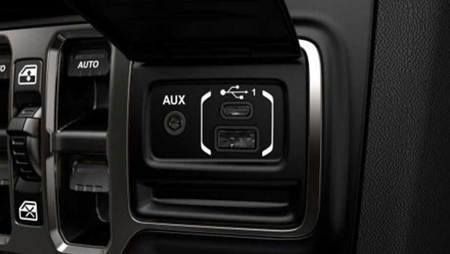 USB and AUX input panel of a Jeep Wrangler 2021-2023