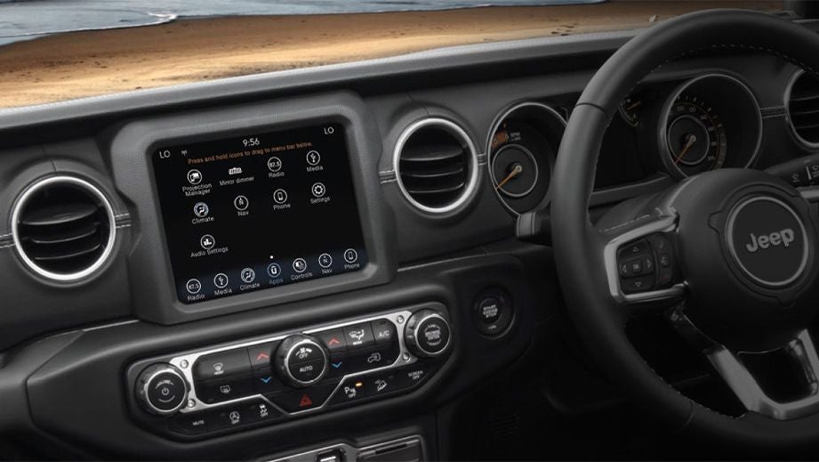 Interior dashboard view of a Jeep Wrangler 2021-2023