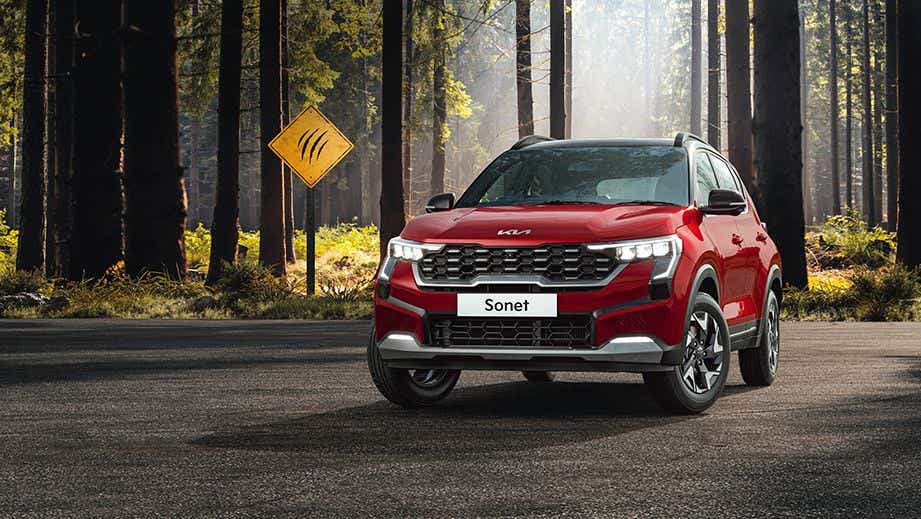 front view of a Intense Red Kia Sonet