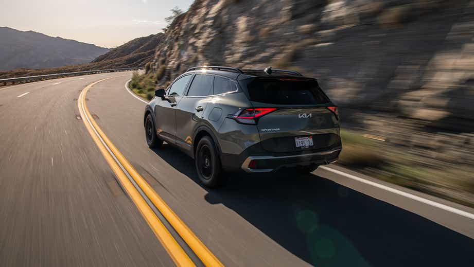Rear three-quarter view of a Black Kia Sportage