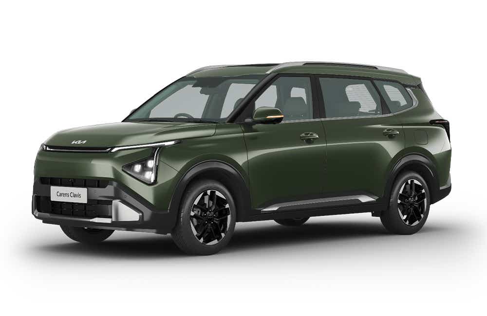 front three-quarter view of a Pewter Olive Kia Carens Clavis
