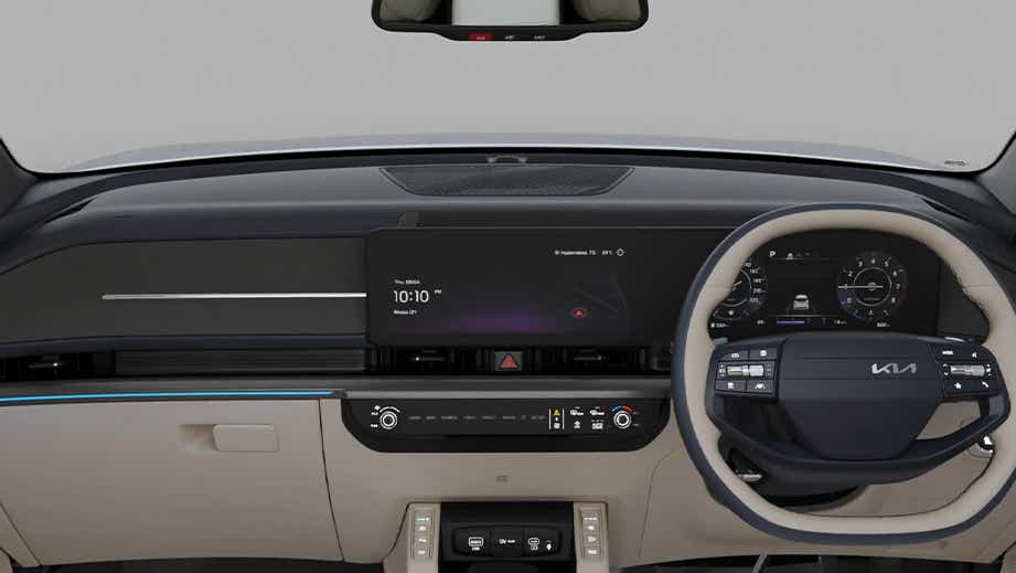 Dashboard and steering wheel view of a Kia Carens Clavis