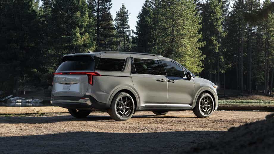 rear three-quarter view of a Kia Carnival