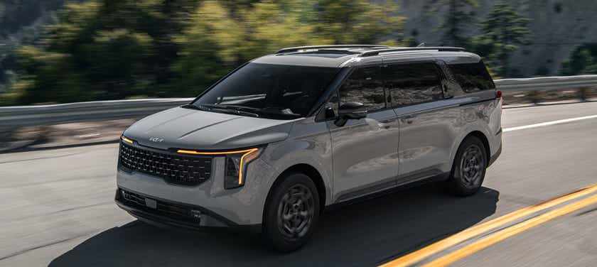 front three-quarter view of a Kia Carnival