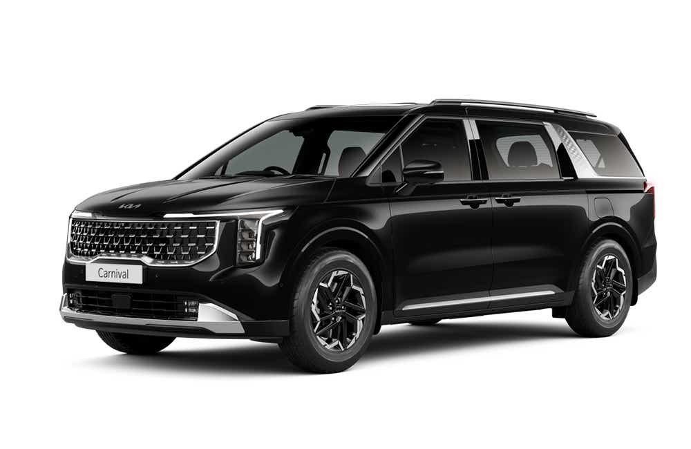 front three-quarter view of a Fusion Black Kia Carnival