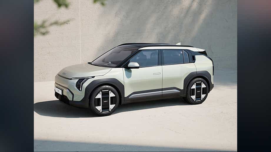 side view of a Glacier White Pearl Kia EV3