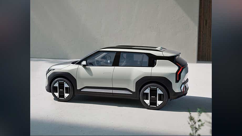 side view of a Glacier White Pearl Kia EV3