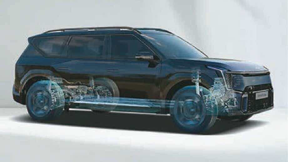 side view of a Kia EV9 showing drivetrain and components