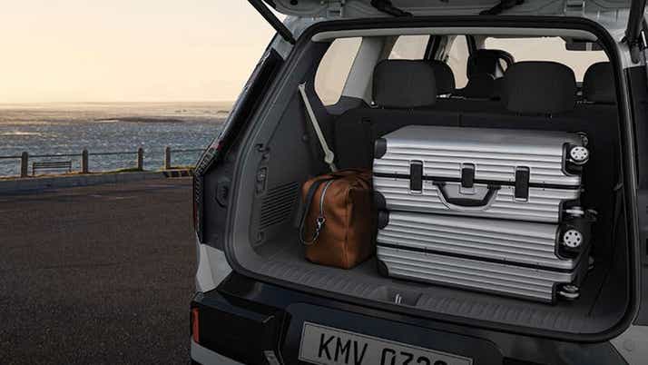 Open boot view of a Kia EV9 showing luggage space