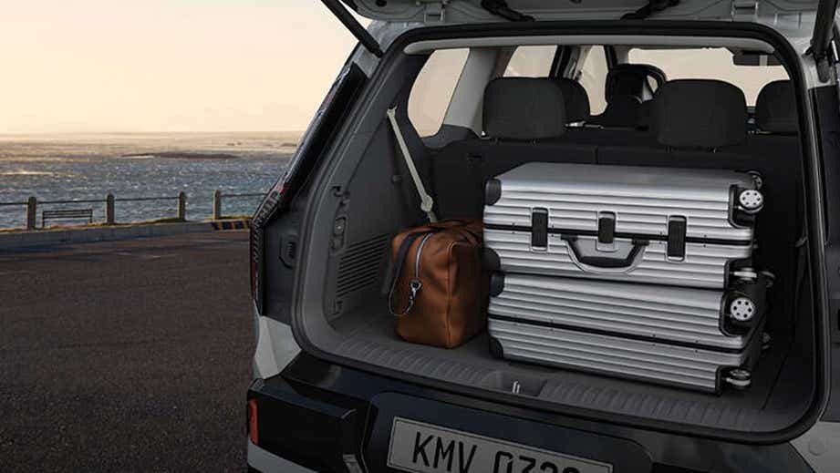 Open boot view of a Kia EV9 showing luggage space