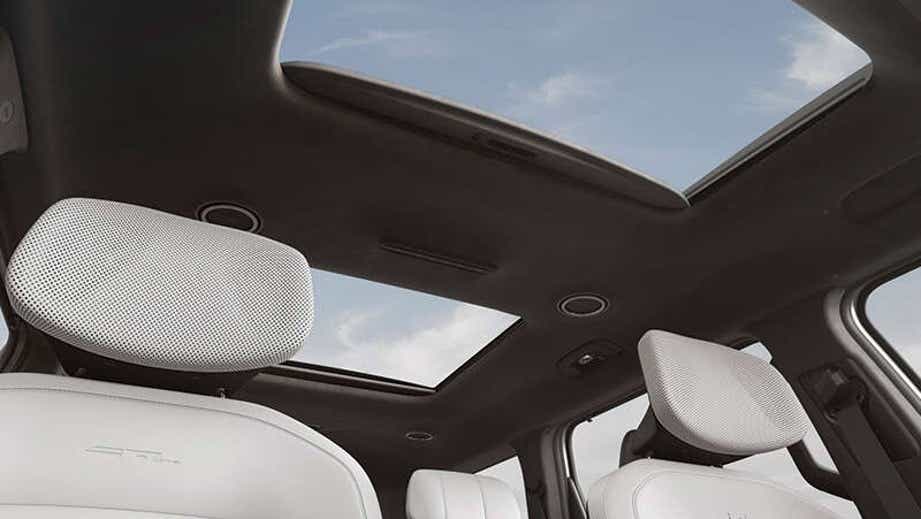 Panoramic sunroof and headrests of a Kia EV9