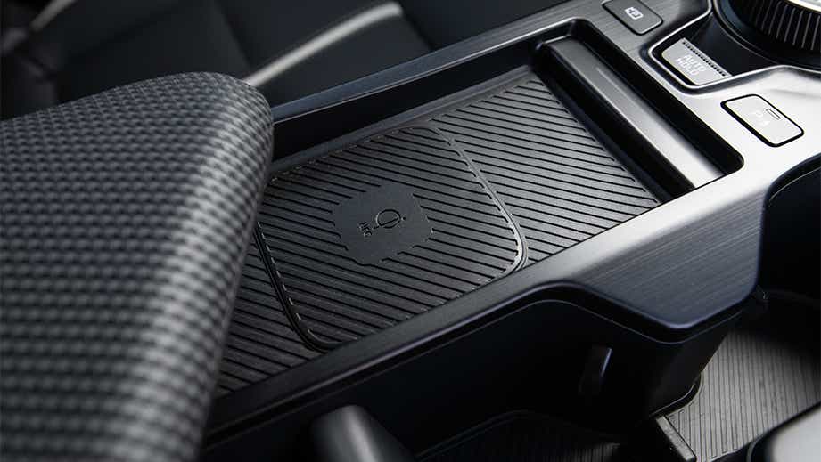 Centre console and wireless charging area of a Kia EV6