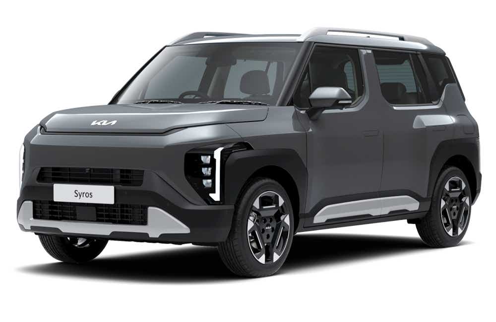 front three-quarter view of a Gravity Grey Kia Syros