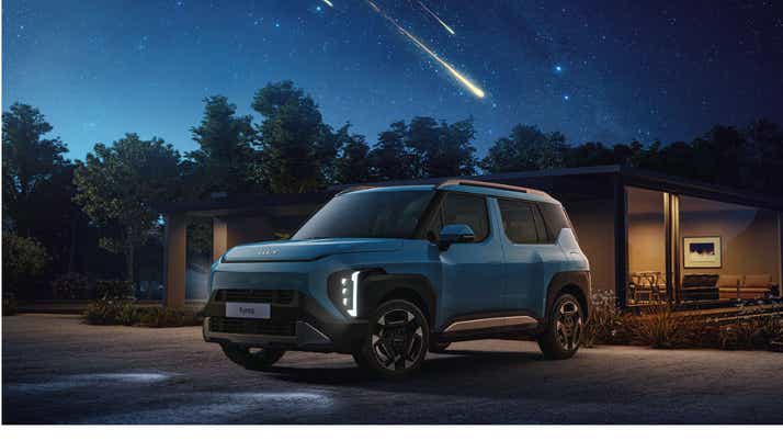 front three-quarter view of a Kia Syros