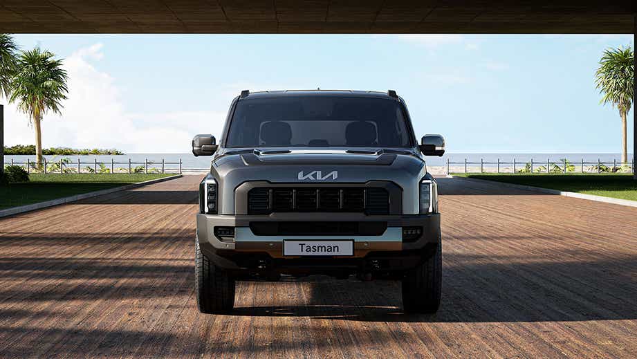Front view of a Magma Grey Kia Tasman