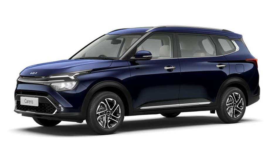 front three-quarter view of a Imperial Blue Kia Carens