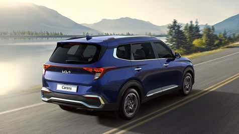 rear three-quarter view of a Kia Carens