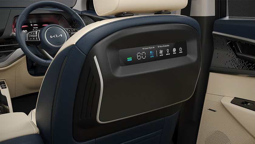 Rear seat entertainment control panel view of a Kia Carens