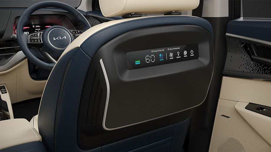 Rear seat entertainment control panel view of a Kia Carens