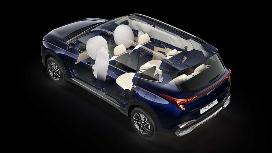 rear three-quarter view showing airbags in a Kia Carens