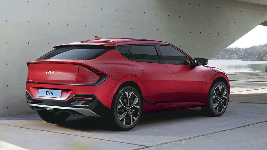 Rear three-quarter of a Runway Red Kia EV6 2022-2024