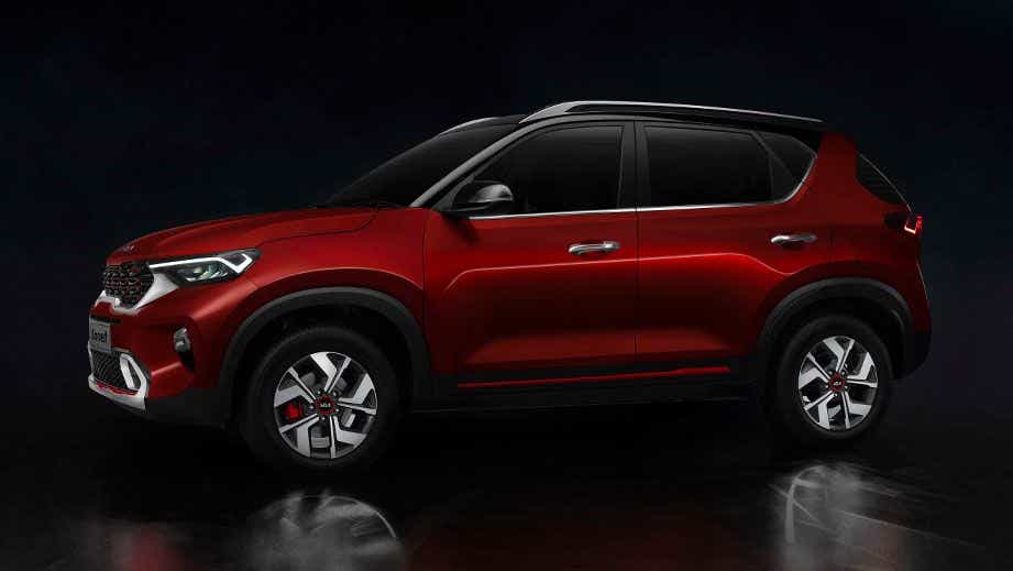 side view of a Intense Red Kia Sonet 2020-2023