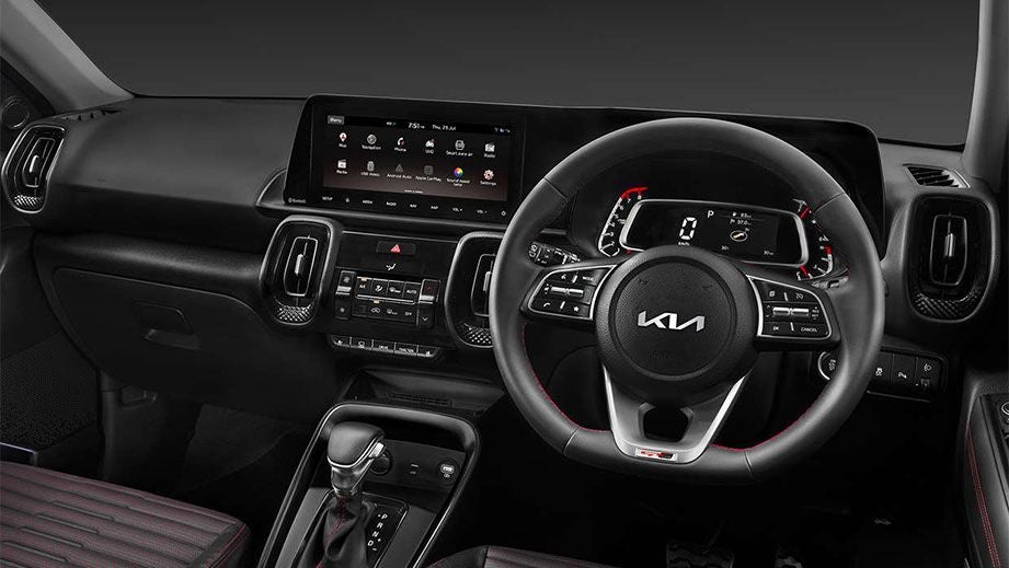 interior dashboard and steering wheel of a Kia Sonet 2020-2023